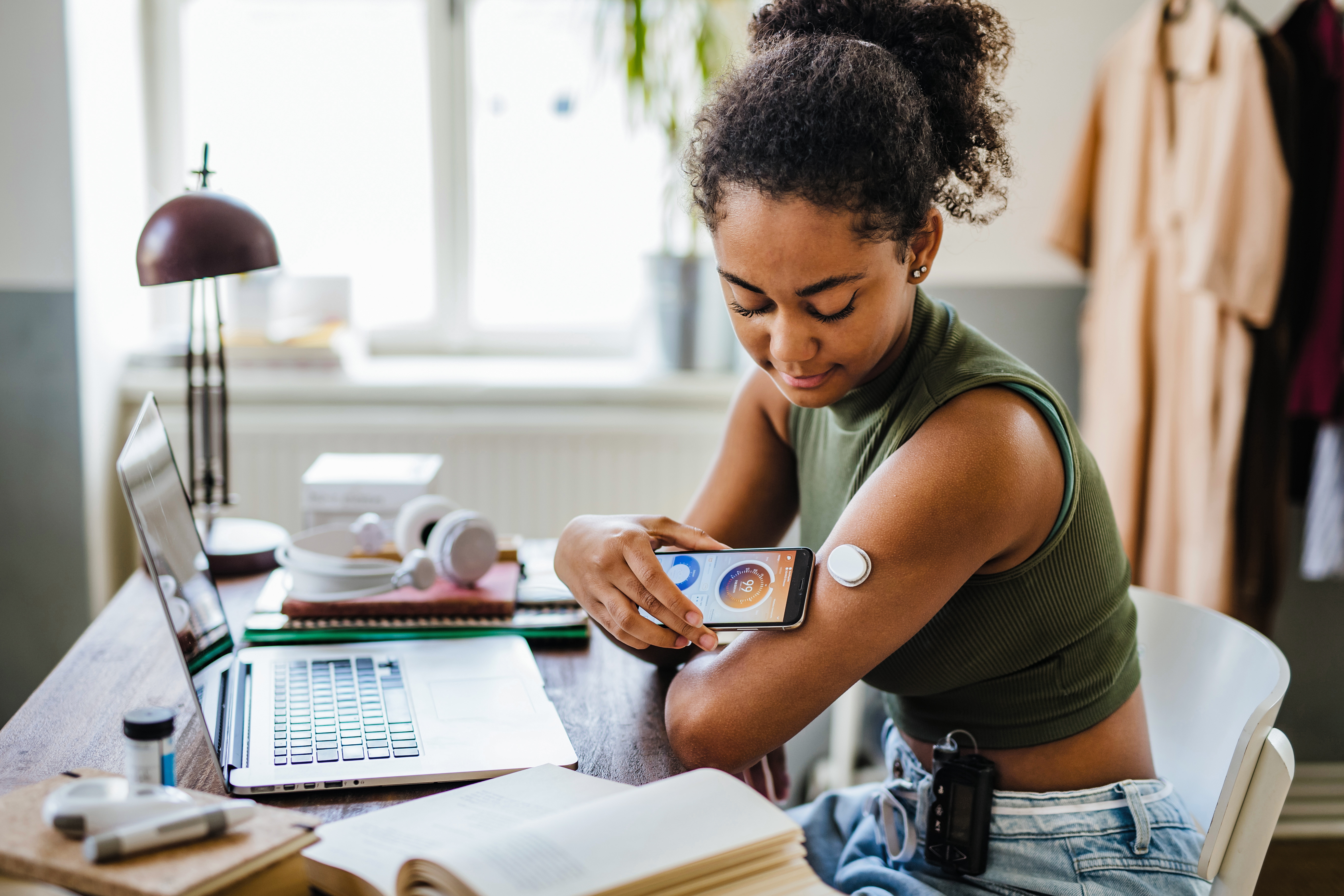 A woman checking her glucose levels