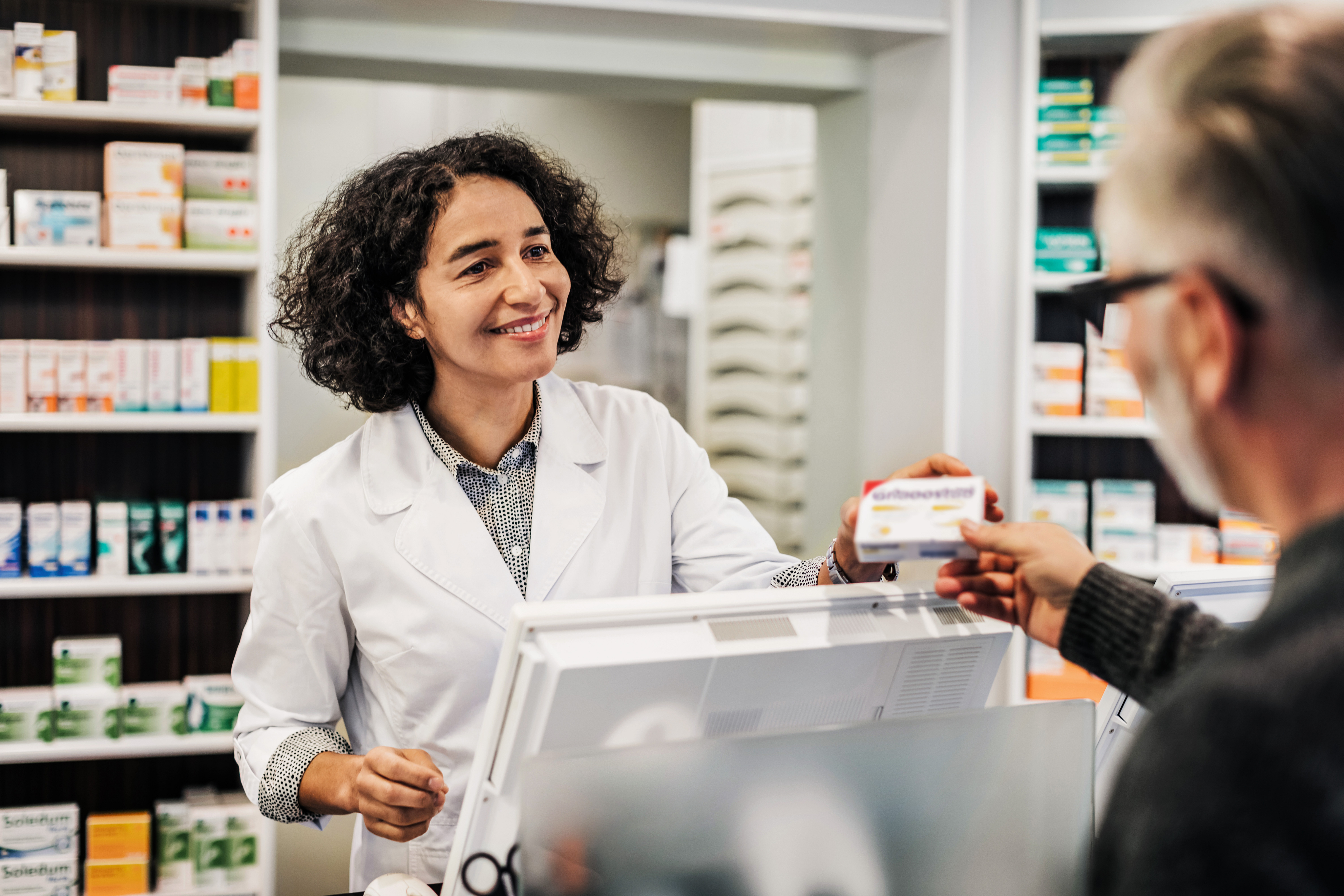 A pharmacist fulfilling a request