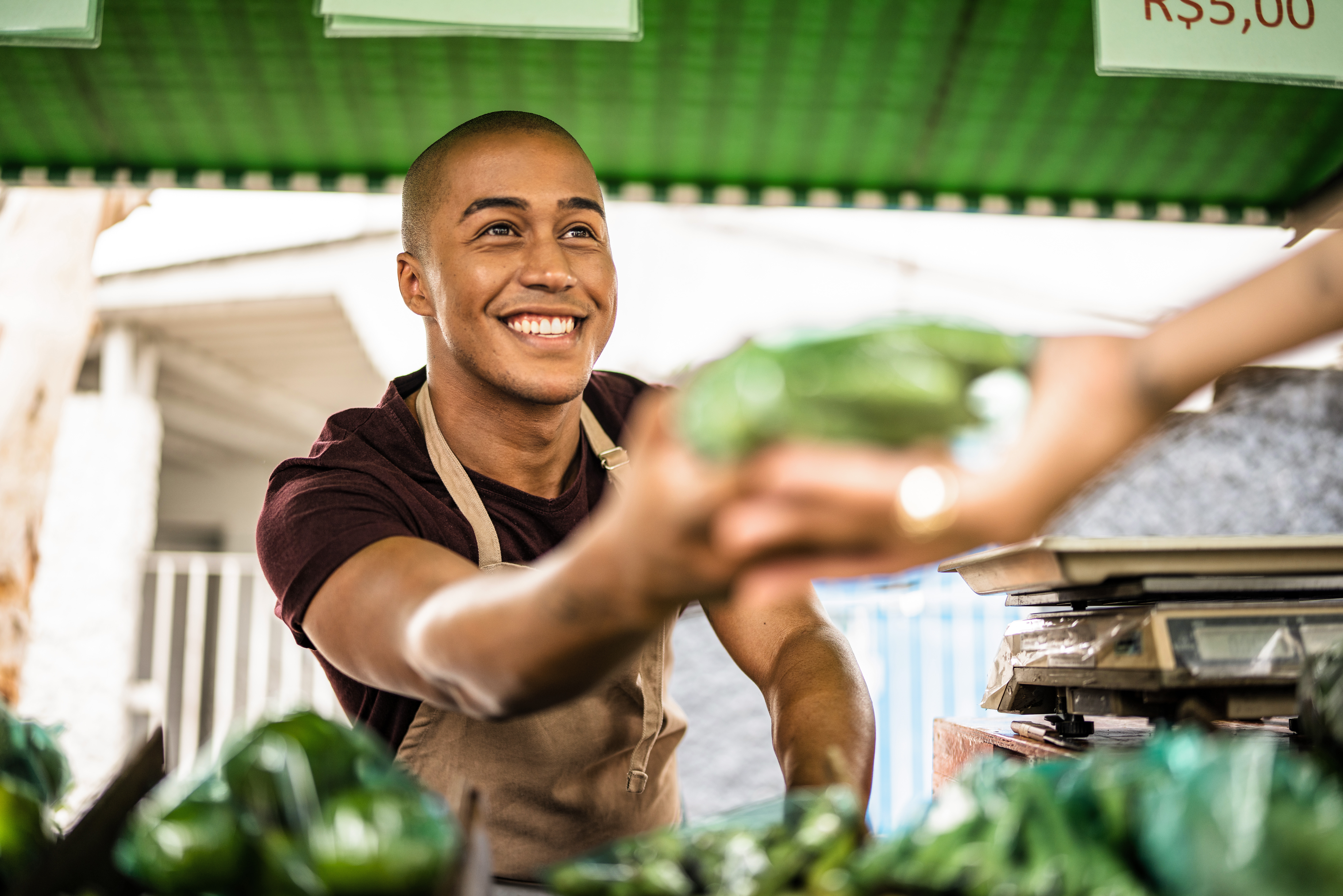 A man serving a customer