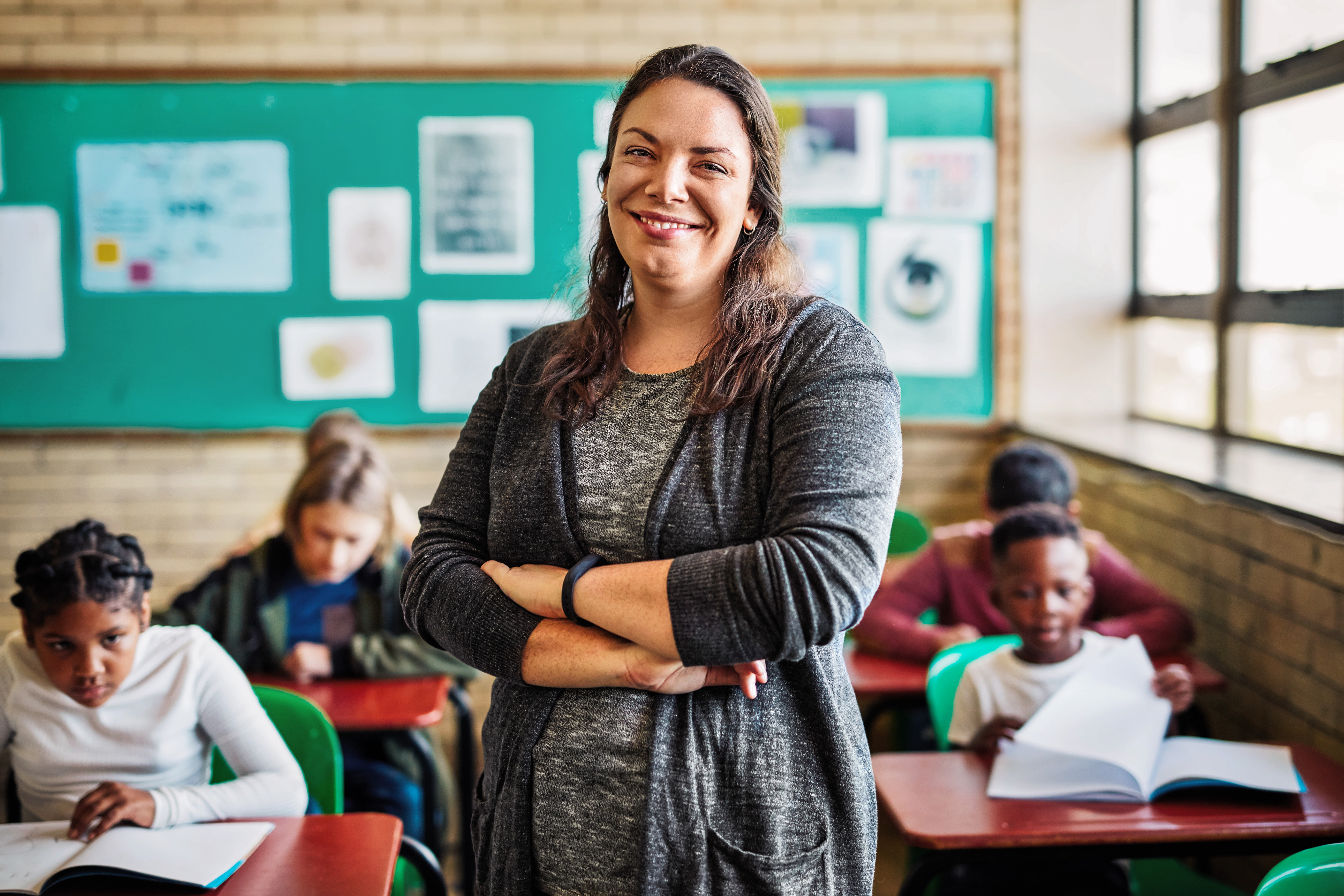 A teacher in a classroom full of students