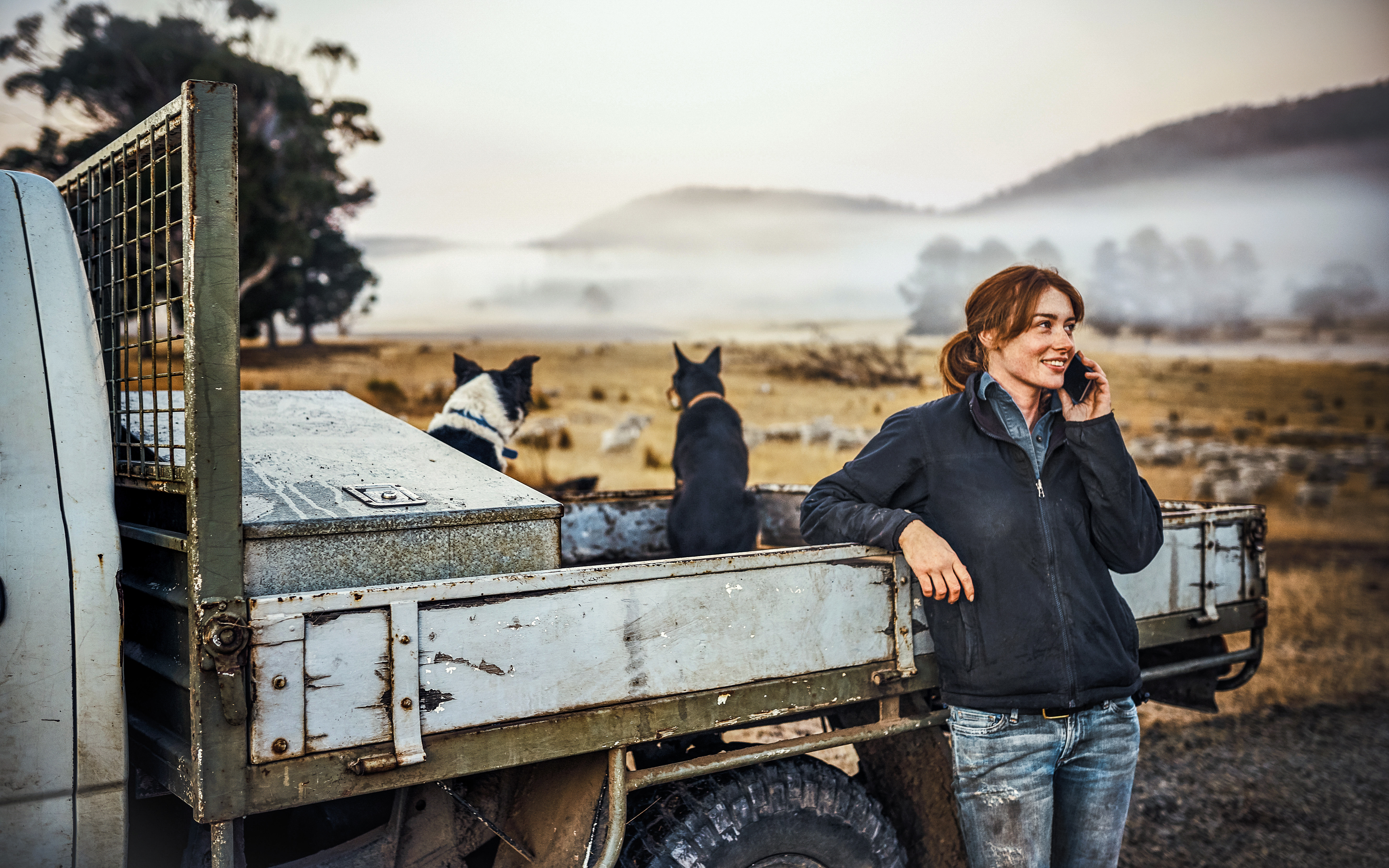A woman taking a call outside