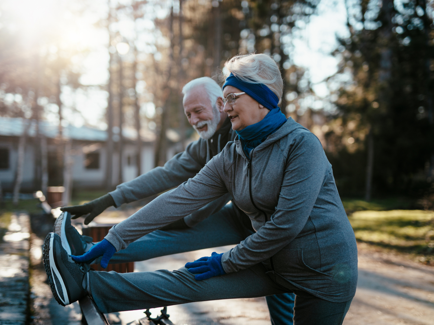 Couple stretching in the cold