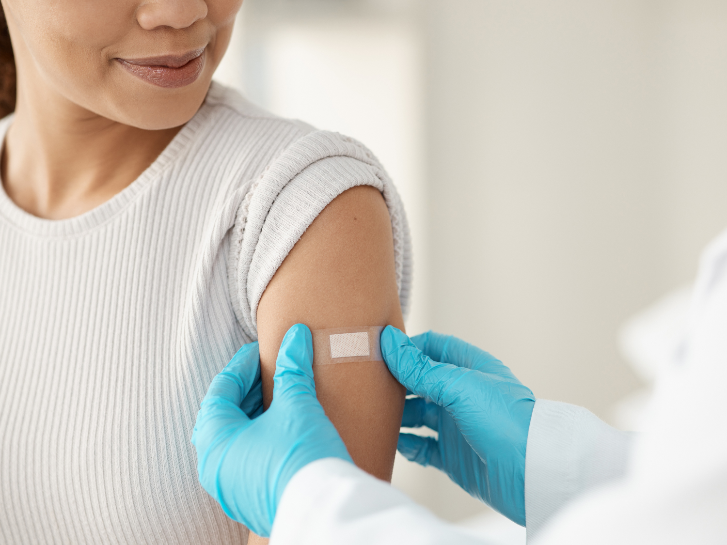 Provider puts band-aid on patient