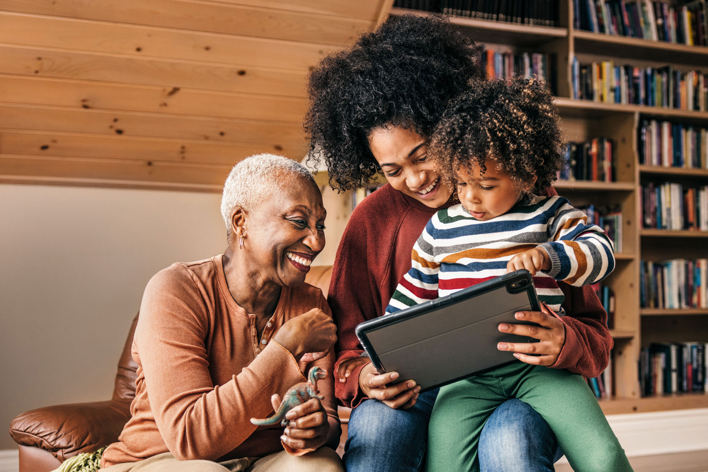 Family playing together on tablet